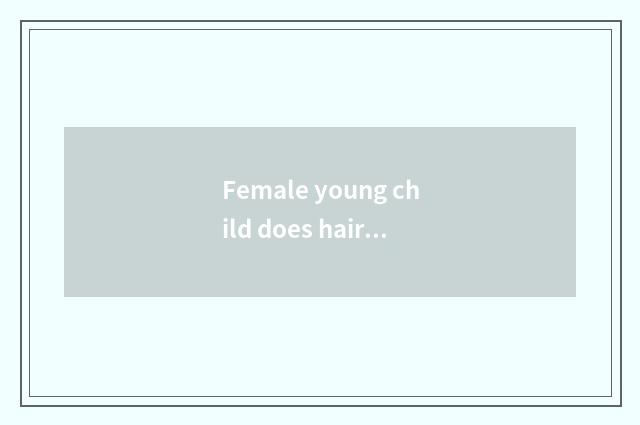 Female young child does hairstyle tie a way?